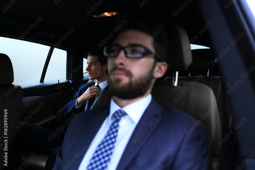 business people sitting in car business people sitting in car
