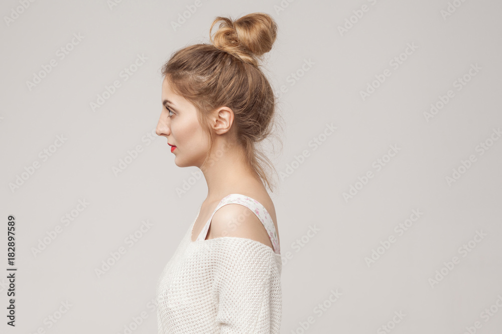 Profile side mixed race blonde woman looking away