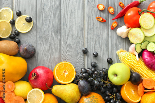 Fototapeta Naklejka Na Ścianę i Meble -  Various fruits and vegetables on wooden background