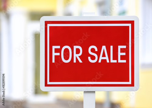 "For sale" sign outdoors