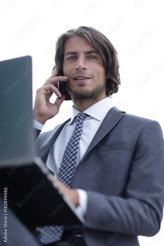 closeup.successful businessman talking on mobile closeup.successful businessman talking on mobile
