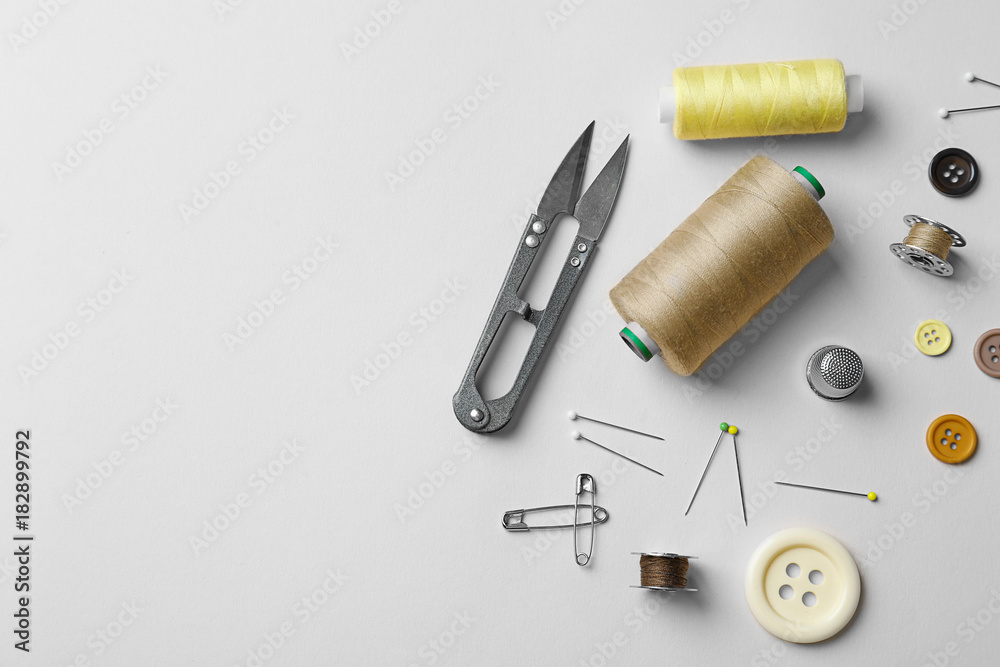 Naklejka premium Accessories for tailoring on white table