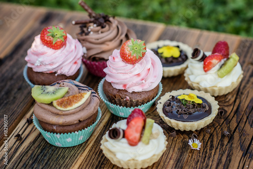 colourful selection on sweet pretty cupcakes
