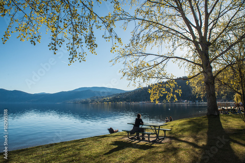 Girl looking at the Okanagan Lake in Peachland British columbia Canada