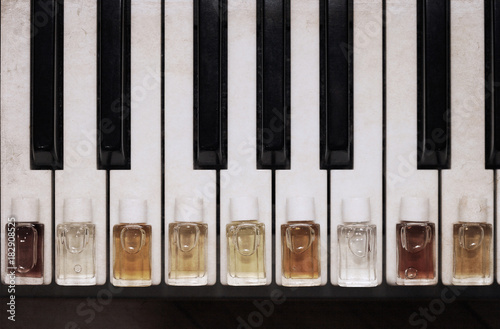 Artwork in vintage style, perfume bottles, piano