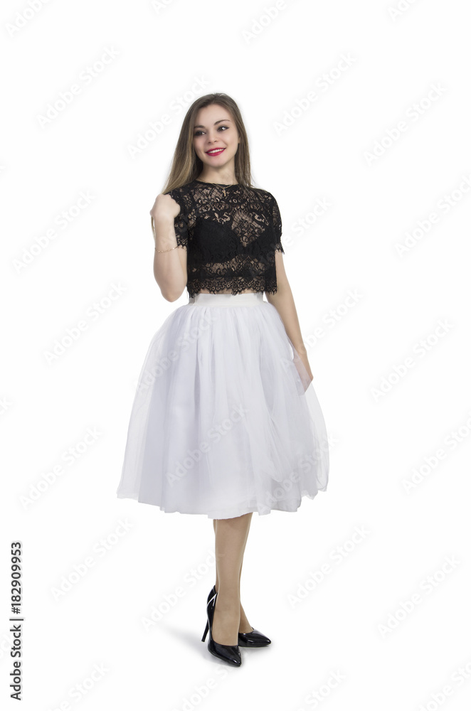 Girl in white skirt posing.