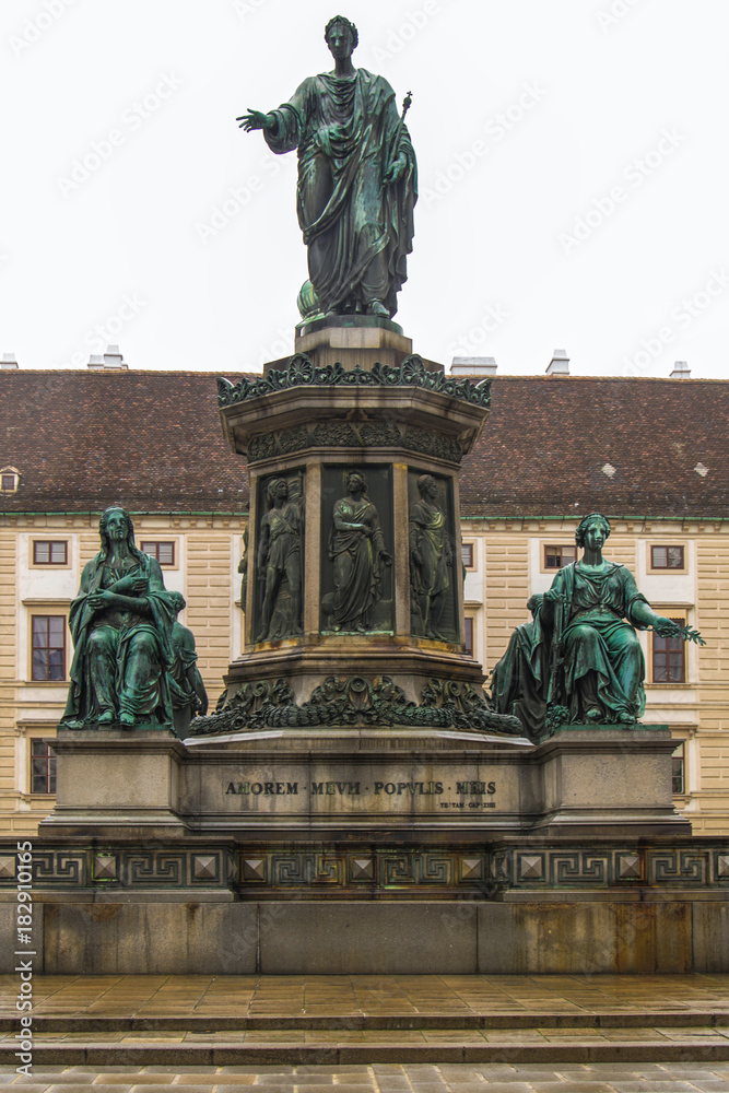 Vienna, Austria - december 31, 2013: Hofburg Palace court with people and monument statue of Emperor Francis I, In der burg, Vienna, Austria