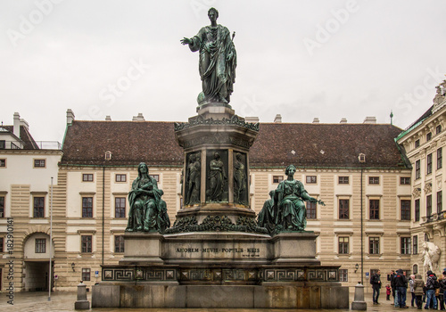 Vienna, Austria - december 31, 2013: Hofburg Palace court with people and monument statue of Emperor Francis I, In der burg, Vienna, Austria