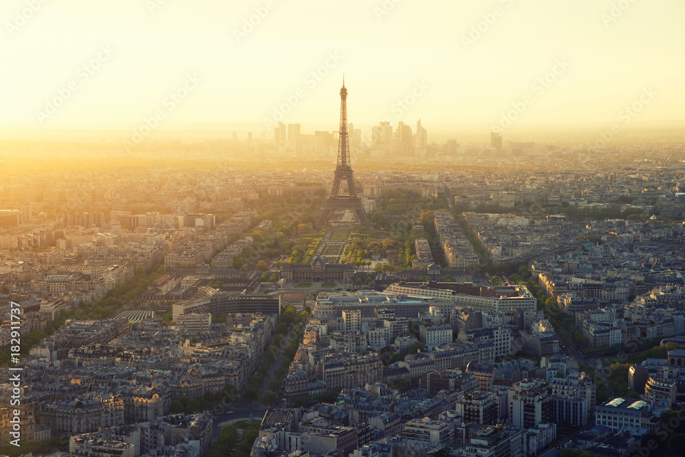 Aerial view of Paris and Eiffel tower at sunset in Paris, France.