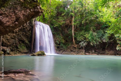 Fototapeta Naklejka Na Ścianę i Meble -  The beauty of limestone waterfall is popular with tourists. And famous of Thailand. In Erawan Waterfall National Park Kanchanaburi