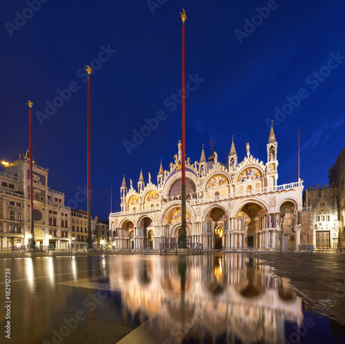 Basilica in San Marco square in Venice with reflection at twilight
