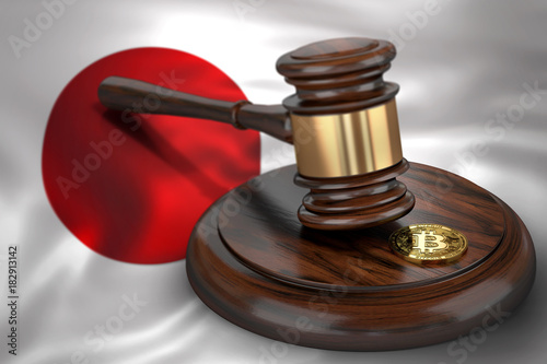 Bitcoin and judge gavel laying on flag of Japan. Bitcoin legal situation in Japan concept. 3D rendering