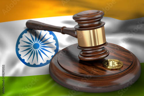 Bitcoin and judge gavel laying on flag of India. Bitcoin legal situation in India concept. 3D rendering