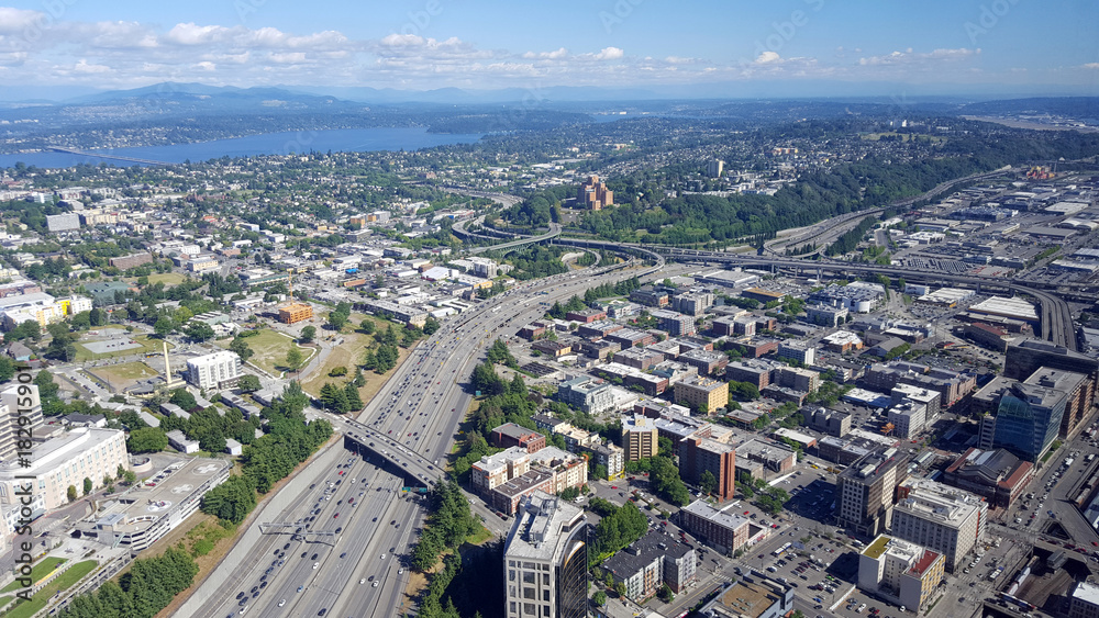 Aerial view of downtown Seattle buildings, Union Lake and I-5 Highway