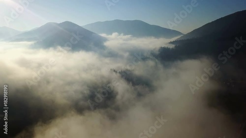 Aerial view of the mountains with a morning fog