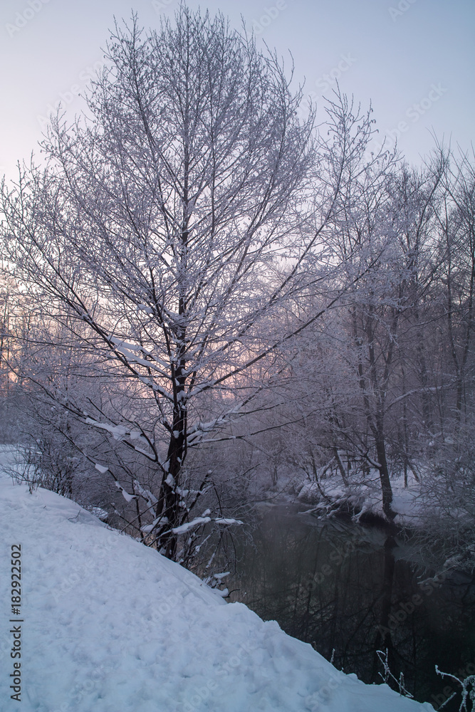 River on the frozen winter day River on the frozen winter day