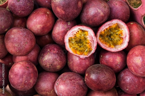Bild auf Leinwand close up of fresh purple passion fruits harvest from farm