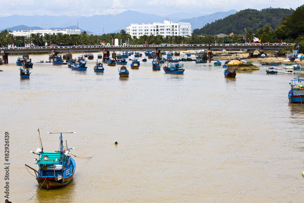 Fototapeta premium Fishing boats on the river Kai. Vietnam. Nha Trang.