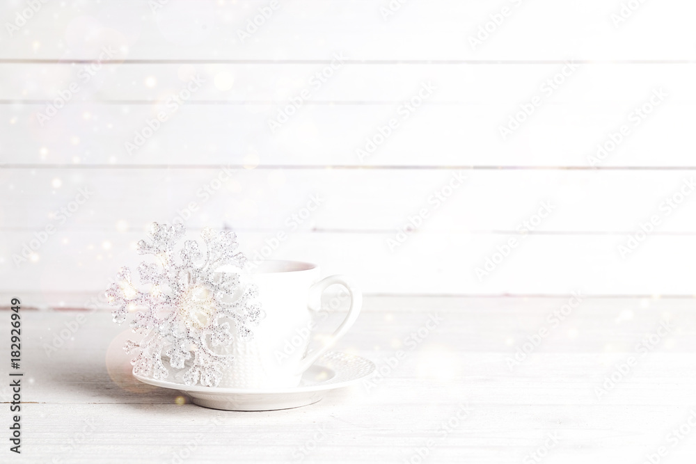 Fototapeta premium Winter drink with Christmas decoration snowflake. Copy space.