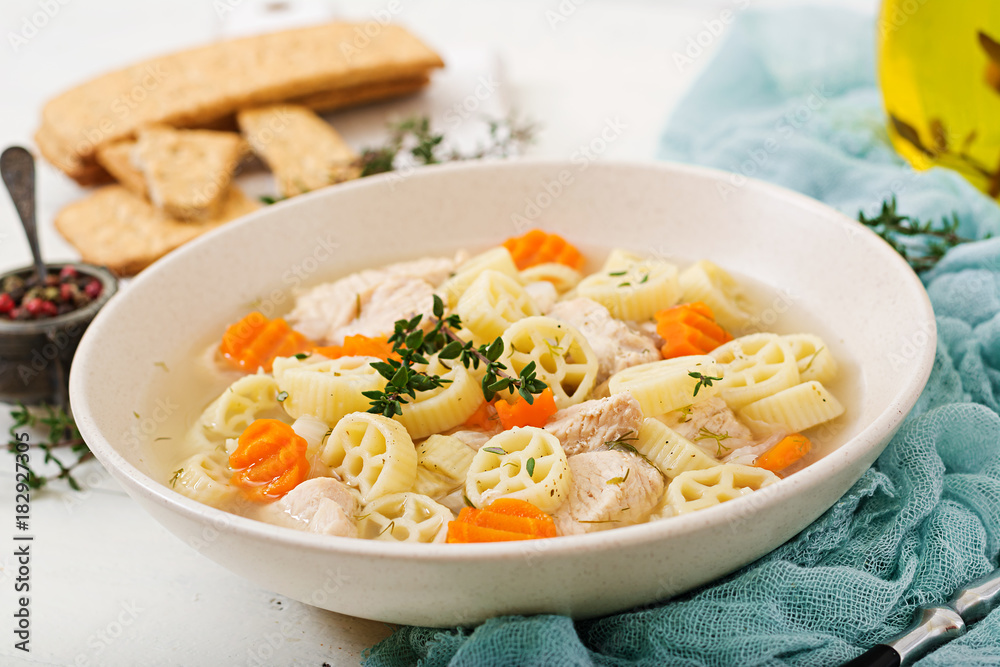 Dietary soup with turkey or chicken fillet with pasta Ruote and herbs Dietary soup with turkey or chicken fillet with pasta Ruote and herbs