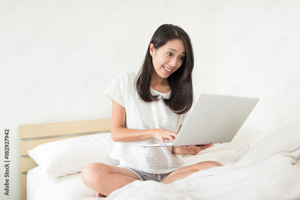 Happy woman work on laptop computer Happy woman work on laptop computer