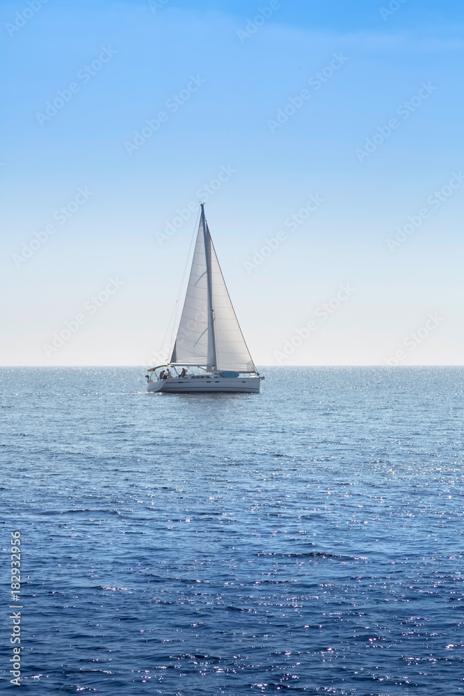 isolated sailboat on blue Adriatic Sea