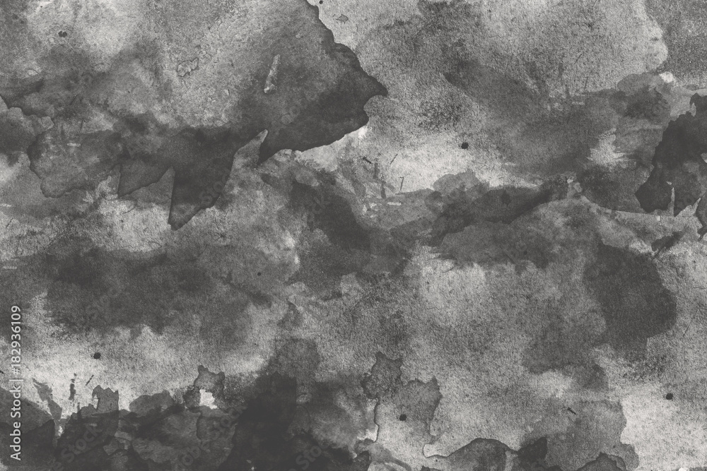 Naklejka premium abstract black splashes on watercolor paper. monochrome image.
