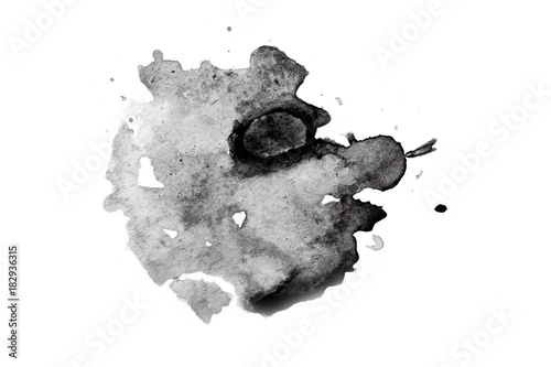 abstract black splashes on white watercolor paper. monochrome image.