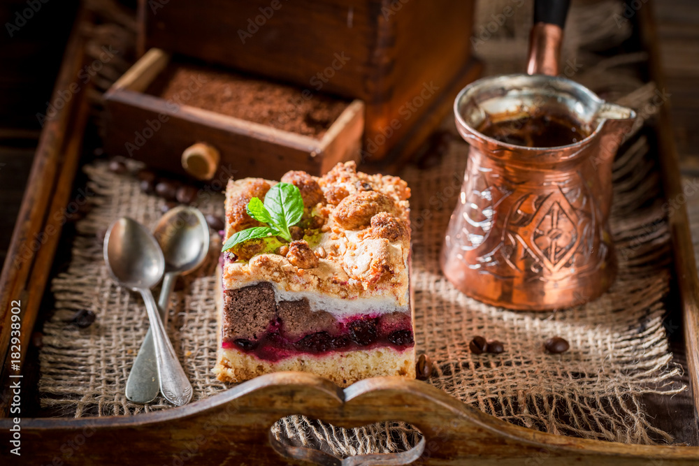 Rustic cherry pie with coffe grinder and grains