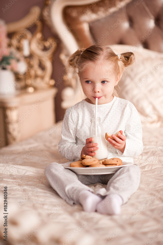 Cute Baby Girl 3 4 Year Old Drinking Milk And Eating Cookies In Bed 