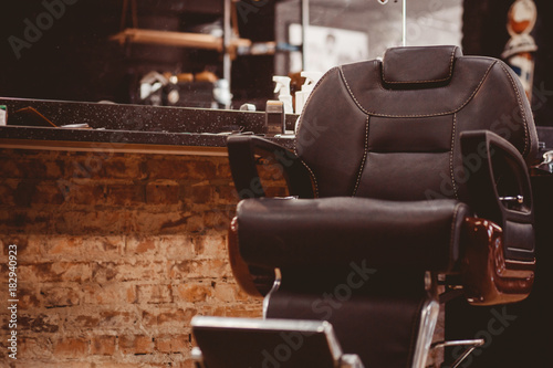 Barbershop armchair. modern hairdresser and hair salon, barber shop for men.