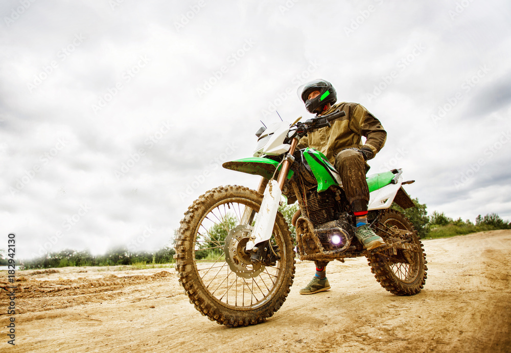Motocross racers on landscape Motocross racers on landscape