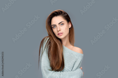 beautiful tender girl posing isolated on grey
