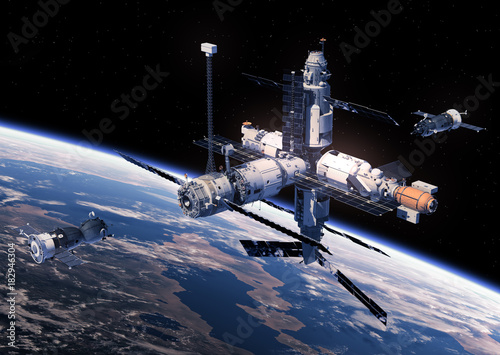 Fototapeta Naklejka Na Ścianę i Meble -  Two Spacecraft Is Preparing To Dock With Space Station