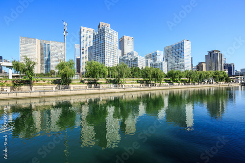 Business district office buildings and water reflection in Beijing