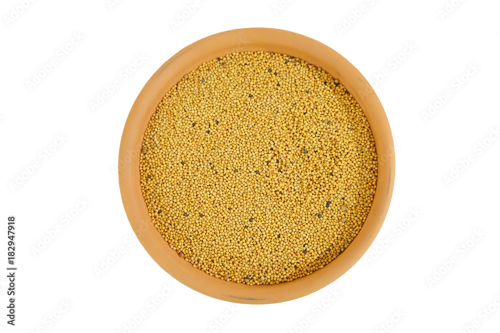 grain yellow mustard in a bowl. isolated on white grain yellow mustard in a bowl. isolated on white