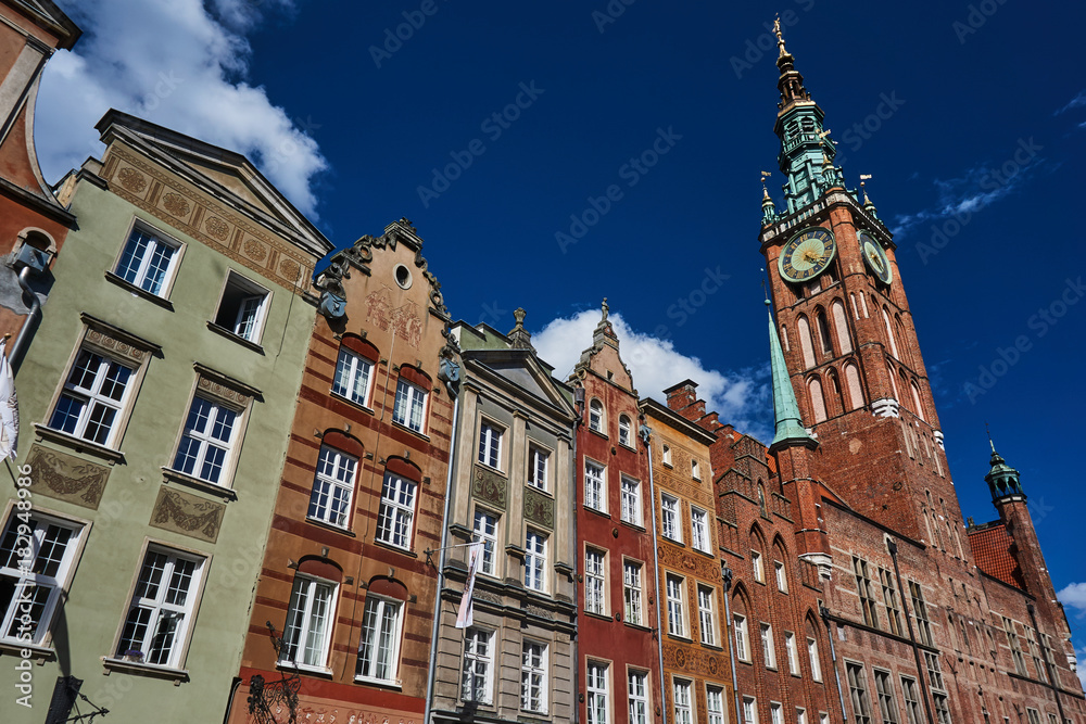 Obraz premium Facade historic tenement houses building and town hall in Gdansk.