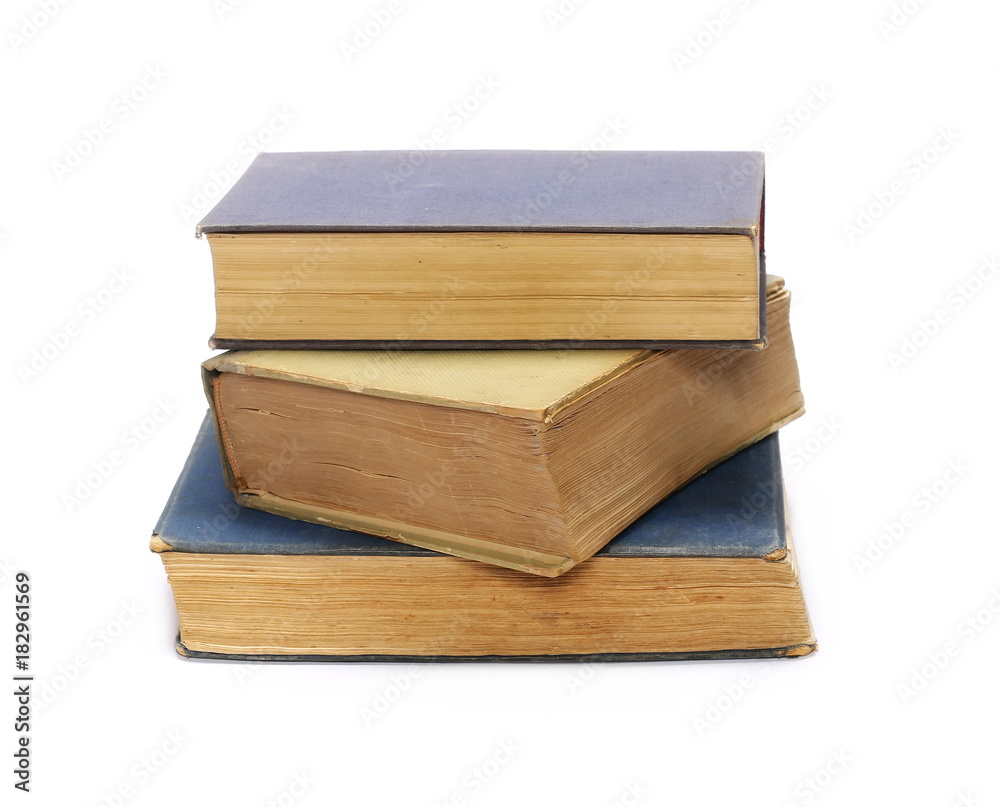 Stack of old antique big books isolated on white background Stack of old antique big books isolated on white background