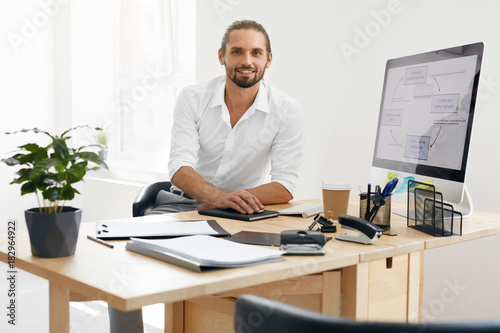 Man In Office. Portrait Of Male Worker © puhhha