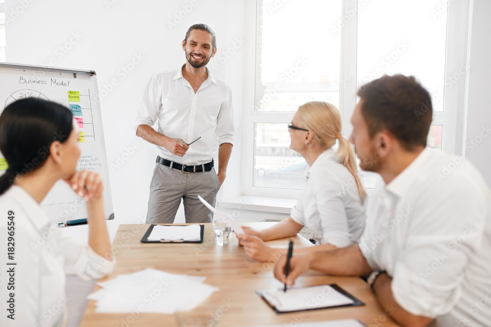 Team Meeting. Business Training With Employees In Office. Team Meeting. Business Training With Employees In Office.