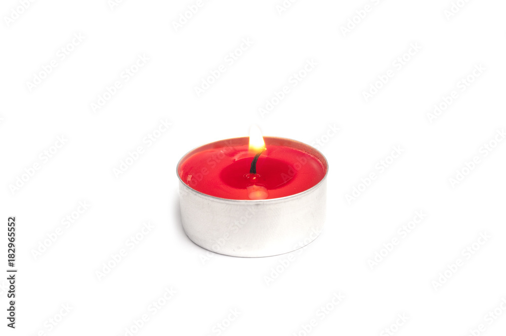 Red Tea light Candle isolated over white background.