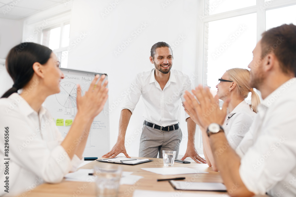Business Team Meeting. Man Making Presentation In Office Business Team Meeting. Man Making Presentation In Office