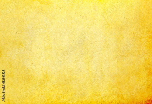 Dirty Yellow Paper Texture. Glowing golden texture background.