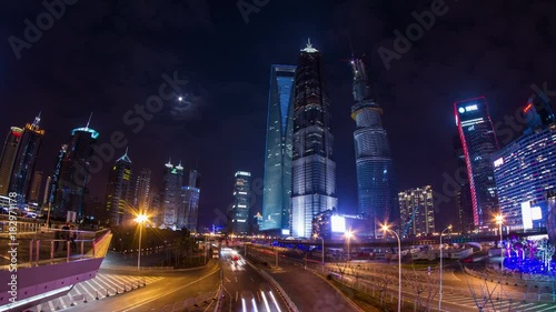 Wallpaper Mural Pudong Skyscraper with traffic and moon rising in Shanghai, China Torontodigital.ca