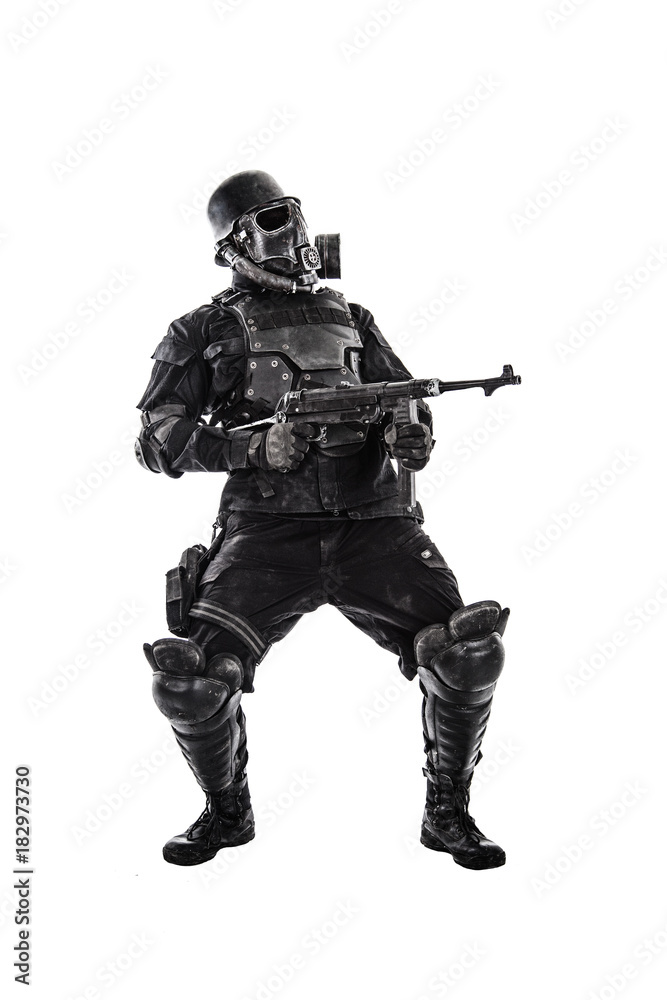 Futuristic nazi soldier gas mask and steel helmet with schmeisser handgun isolated on white studio shot full body portrait Futuristic nazi soldier gas mask and steel helmet with schmeisser handgun isolated on white studio shot full body portrait