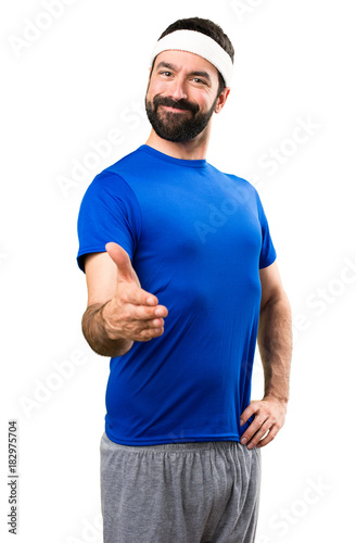 Funny sportsman making a deal on isolated white background