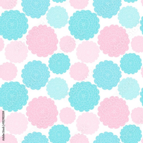 Cute floral seamless pattern with hand drawn mandala designs in blue and pink colors