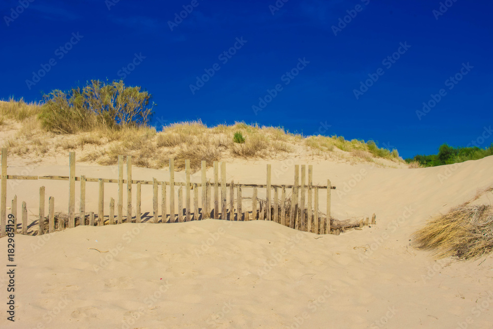Old wooden fence. Punta Paloma beach, Tarifa, Spain.