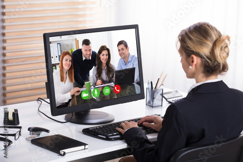 Businesswoman Video Conference With Her Colleagues