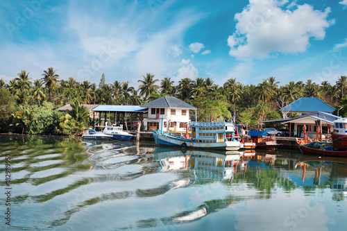 Chumphon, Thailand - 9 February 2014: Fishing boats at the coastal fishing villages. Preparation sea fishing photo